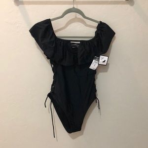 Black one piece swimsuit never been worn tags on